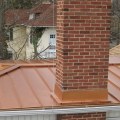 What is the longest lasting flat roof material?